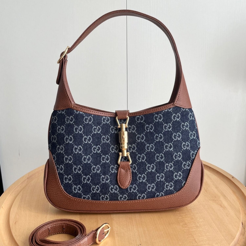G*u*i top handle bags